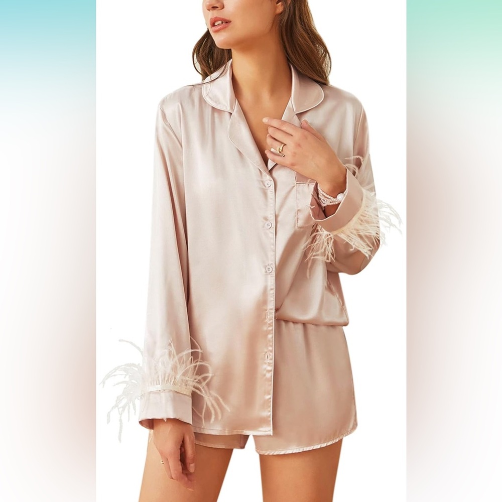 Brand new champagne colored satin set, size medium, removable feather sleeves